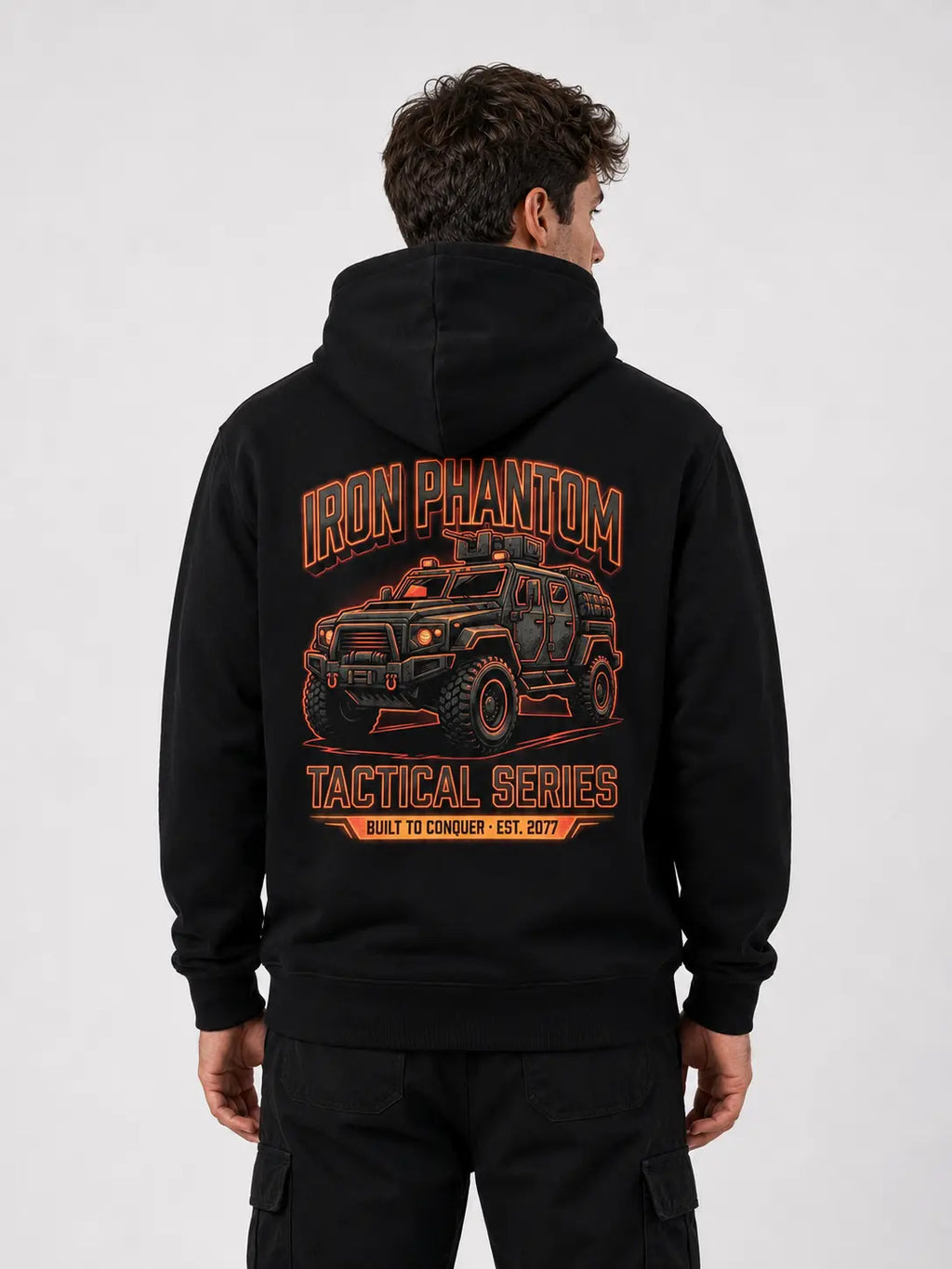 IRON PHANTOM Tactical Series Cyberpunk Armored Vehicle Hoodie - back view showing large orange armored combat vehicle graphic print with Iron Phantom Tactical Series Built to Conquer Est. 2077 typography, white studio background