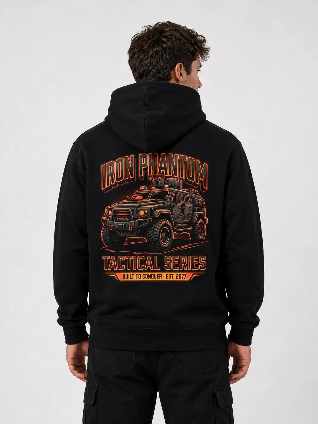 IRON PHANTOM Tactical Series Cyberpunk Armored Vehicle Hoodie - back view showing large orange armored combat vehicle graphic print with Iron Phantom Tactical Series Built to Conquer Est. 2077 typography, white studio background
